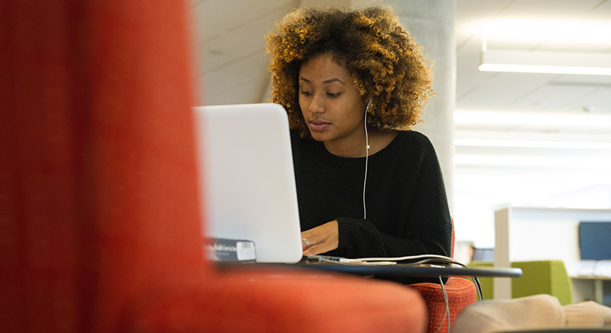 Female student on a laptop